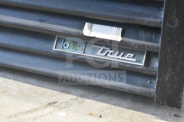 True GDM-49-HC cooler label showing brand and natural refrigerant logo. 2017 model, tested and working. 115 Volts, 1 Phase.