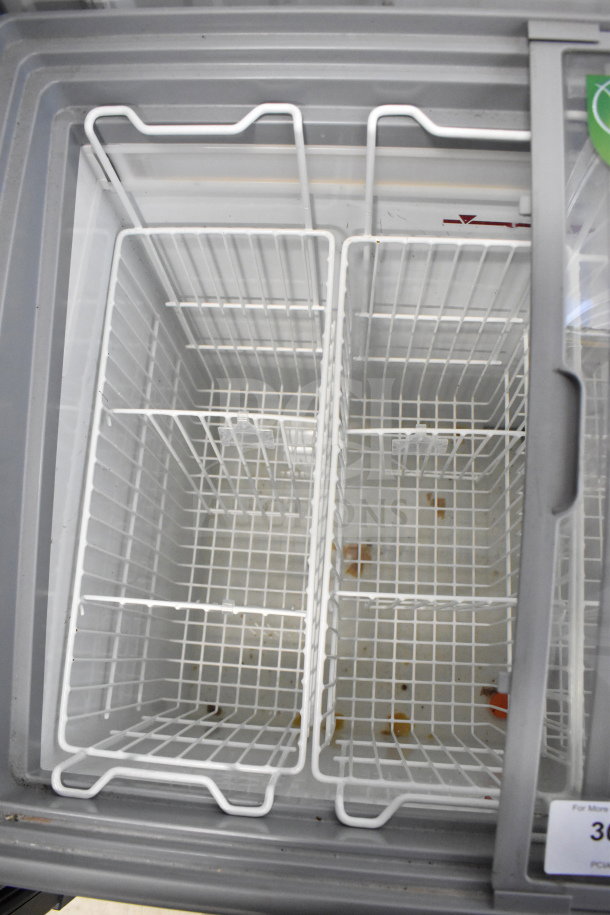 AHT RIO S 100 Commercial Chest Freezer, 115 Volts, 1 Phase, clean interior with wire baskets, good condition.