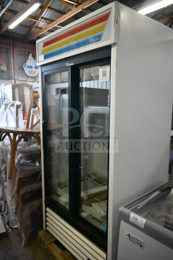 Brand new 2025 True GDM-33-HC-LD commercial 2-door cooler. Scratch and dent model, 115V, 1 phase, vibrant signage.