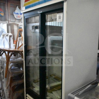 Brand new 2025 True GDM-33-HC-LD commercial 2-door cooler. Scratch and dent model, 115V, 1 phase, vibrant signage.