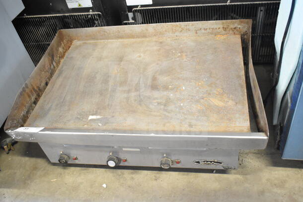 Star Commercial Electric Griddle, countertop model. Flat top surface with visible wear; Star logo on front panel.
