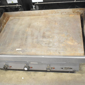 Star Commercial Electric Griddle, countertop model. Flat top surface with visible wear; Star logo on front panel.