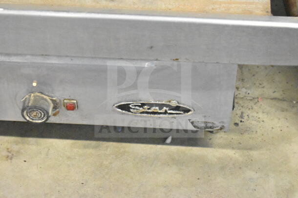 Star Commercial Electric Flat Top Griddle, countertop model, steel body, visible wear, features dial and indicator light.