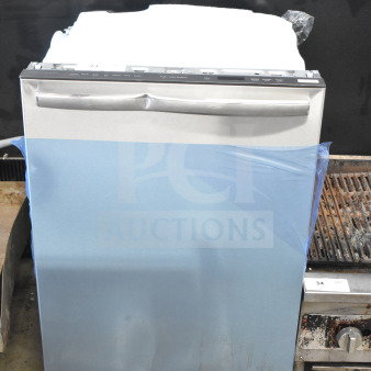 Frigidaire undercounter dishwasher, stainless steel finish, protective wrap, visible controls, excellent condition.