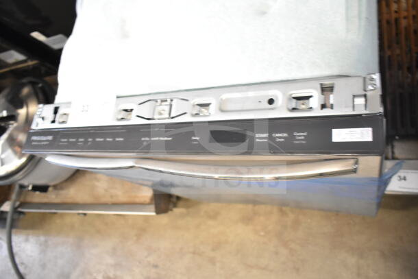 Frigidaire undercounter dishwasher, control panel visible, stainless steel handle, new condition, model details not shown.