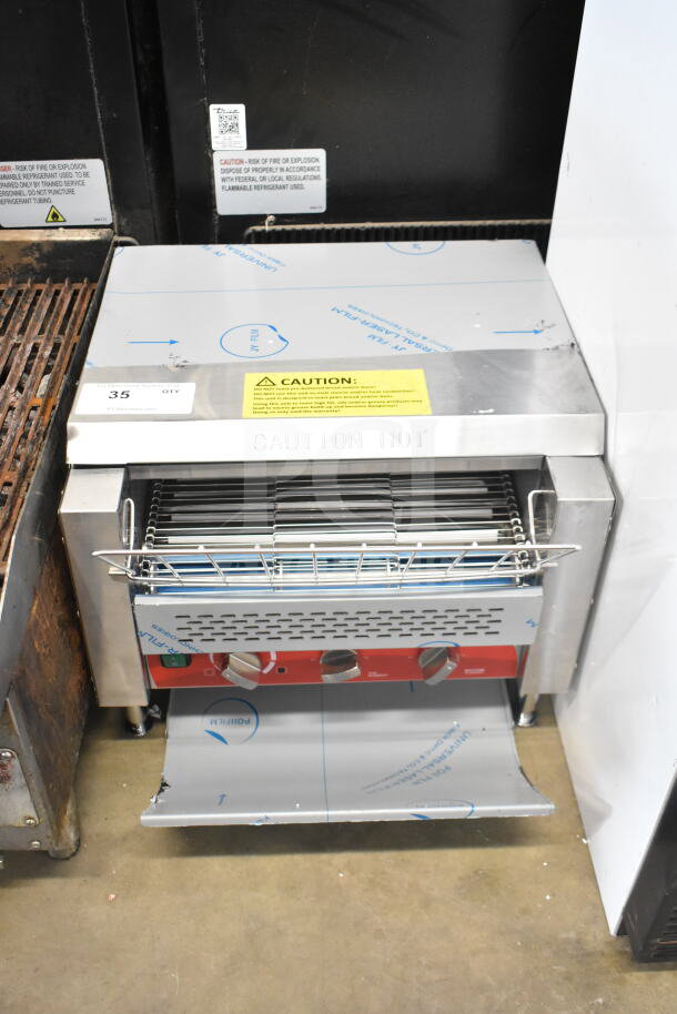 Brand new Avantco 184T3600B commercial conveyor toaster, 14.5" wide, 3" opening, 1200 slices/hour, labeled for caution.