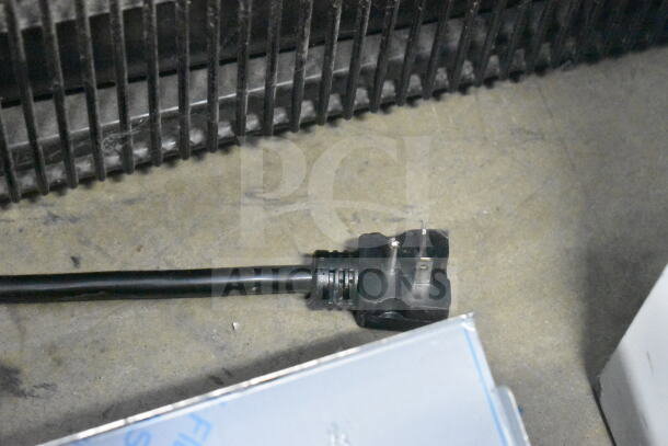 Power cord for Avantco 184T3600B conveyor toaster, highlighting plug and gridded back panel in new scratch and dent condition.