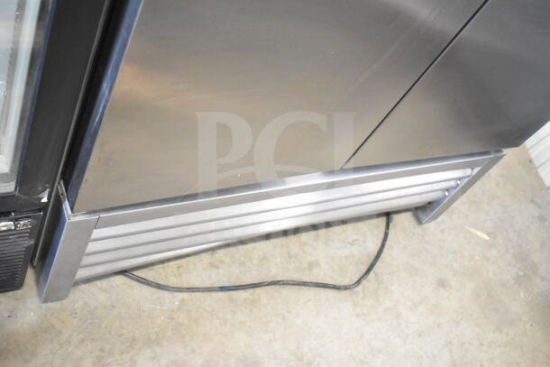 2016 True T-35 Commercial 2 Door Reach In Cooler with stainless steel finish, minor wear. Uses 115 volts, 1 phase power.