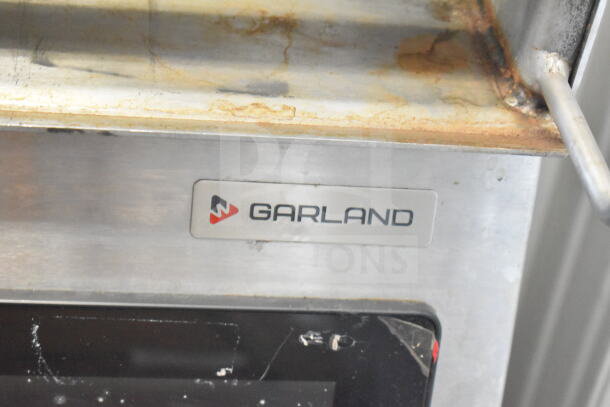 Garland CXPB12 electric flat top grill with clamshell, 208-240V, 3 Phase. Brand label visible, used condition.