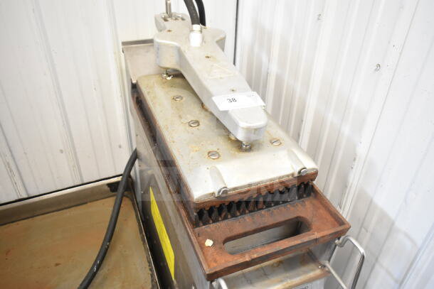 Garland CXPB12 commercial flat top grill with clamshell, 208-240V, 3 phase. Visible wear and electrical cords. Model tag attached.