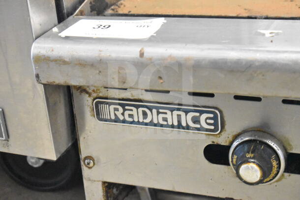 Radiance Commercial Countertop Flat Top Griddle, showing brand name and control knob, in used condition.