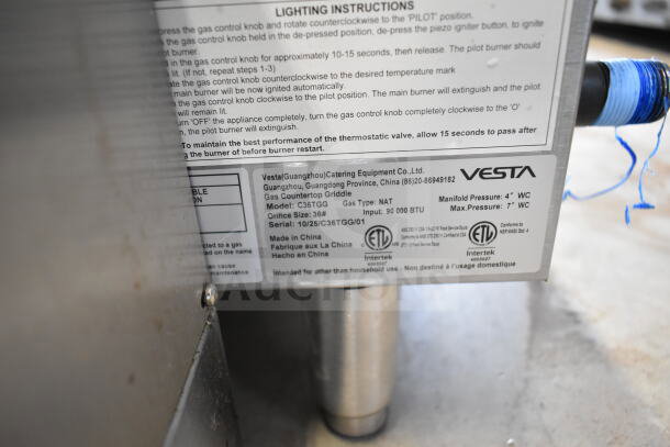 2025 Vesta C36TGG Commercial Gas Griddle with 90,000 BTU output. Image shows manufacturer's instruction label and specifications.