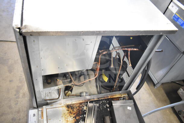 Hoshizaki KM-900MRH Commercial Ice Machine Head, 208-230V, 1 Phase; visible wear and rust, internal components exposed.