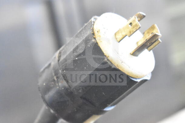 Hoshizaki KM-900MRH commercial ice machine head plug, black and white, 208-230 volts, 1 phase.