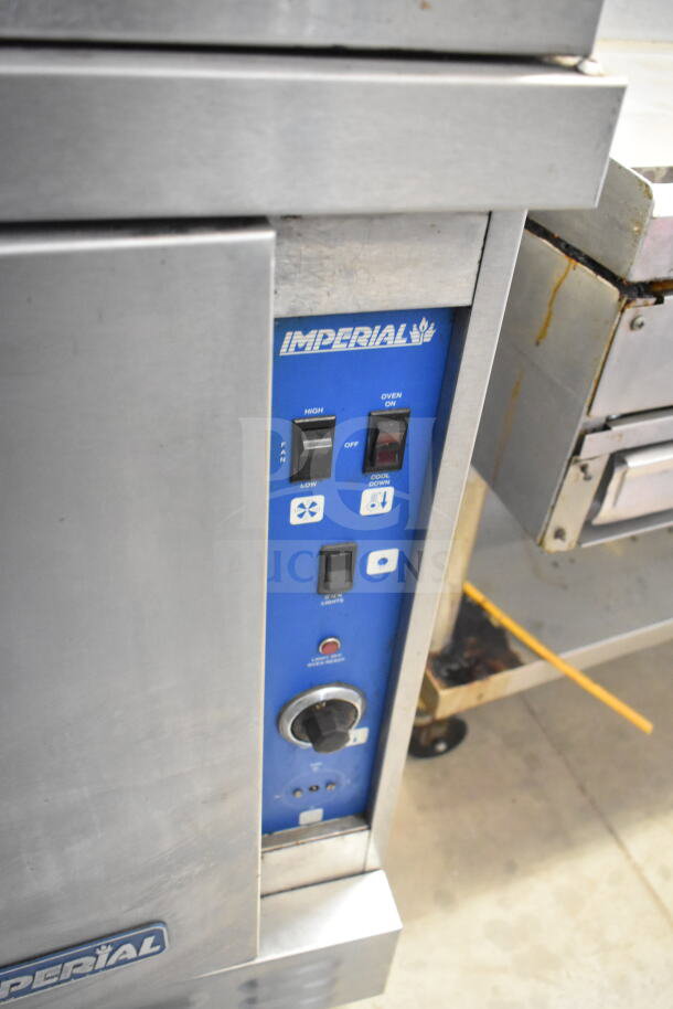 Imperial commercial full-size convection oven with view-through and solid doors, thermostatic controls visible, good condition.