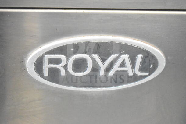 Royal logo on stainless steel surface of convection oven, indicating brand authenticity and quality.