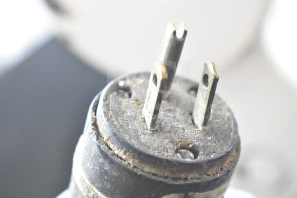 Rusty power plug of a Dutchess Commercial Floor Style Dough Divider, indicating wear and potential repair needs.