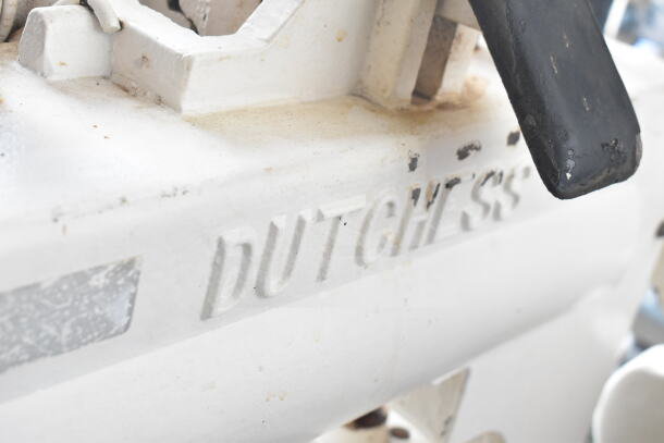 Dutchess Commercial Floor Style Dough Divider with embossed branding. Shows signs of use, robust construction for bakery use.