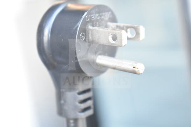 Close-up of a power plug for 2020 True GDM-26-HC cooler, 115 volts, single-phase; commercial use.