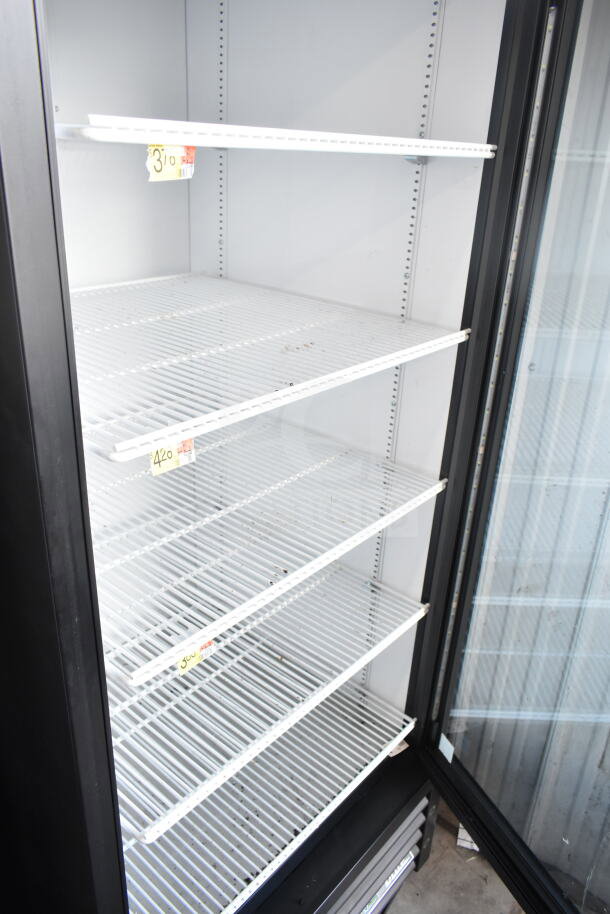 2020 True GDM-26-HC commercial cooler, single door, four shelves, model in good condition. 115 volts, 1 phase.