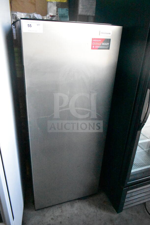 Frigidaire FGFRF1008 convertible cooler freezer, single door, 115 volts, 1 phase, garage ready label visible, silver finish.