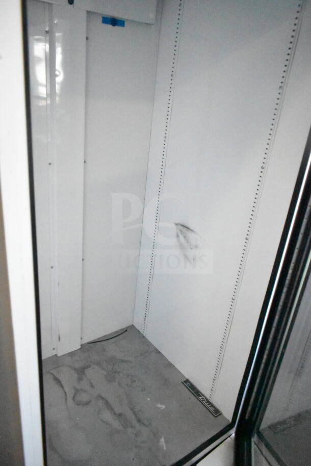 2021 True TSCI-600R-G-PH commercial cooler, single glass door, some interior marks, 115V, 1 phase, model label visible.