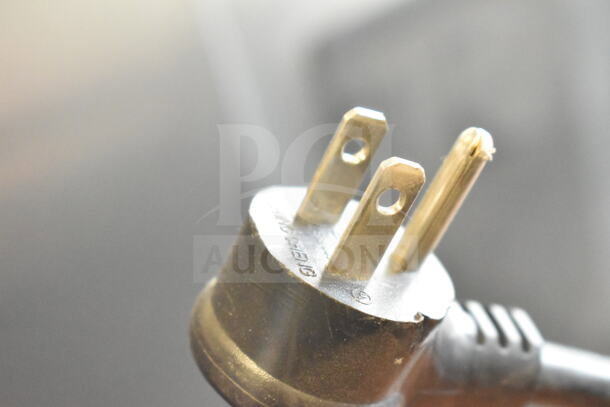 Close-up of power plug for 2021 True T-19F-HC commercial freezer, indicating 115 volts, 1 phase.