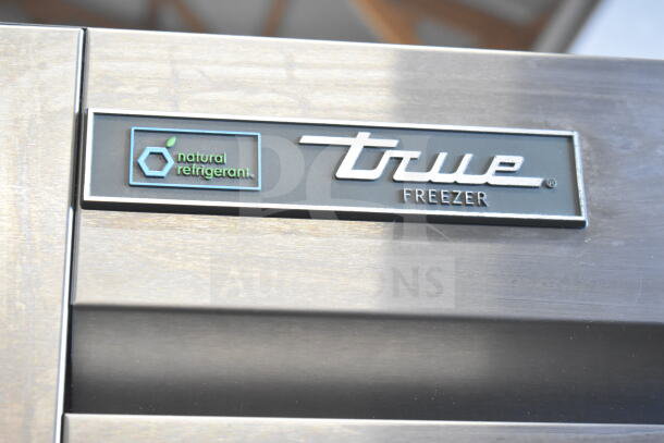 2018 True T-19F-HC commercial freezer, natural refrigerant label, stainless steel finish. 115 volts, single phase.
