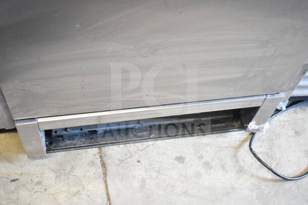 2018 True T-19F-HC single door freezer, 115V, commercial use. Visible base and electrical cord, in used condition.