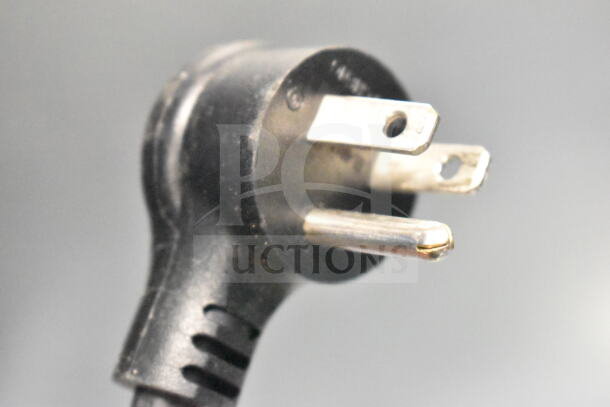 Close-up of a three-prong power plug for the 2022 True GDM-26-HC cooler, 115 Volts, in excellent condition.