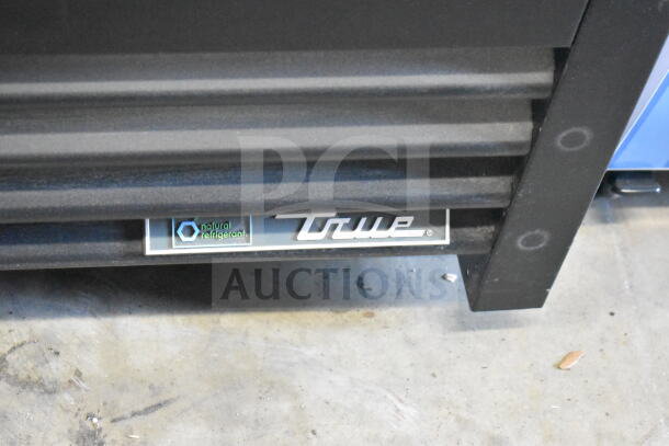 2022 True GDM-26-HC cooler merchandiser, single door, 115 volts, 1 phase, natural refrigerant label, excellent condition.