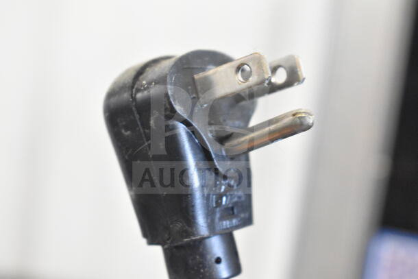 Close-up of a power plug for the 2022 Amana RCS10TS Commercial Microwave Oven. 120 Volts, used condition.