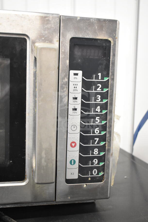 2022 Amana RCS10TS commercial microwave, 120V, 1 Phase, showing keypad control panel and handle, used.