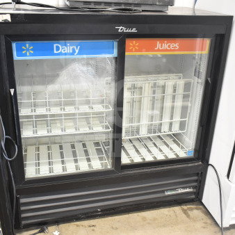 2019 True GDM-41SL-48-HC-LD commercial 2-door cooler merchandiser, black frame, glass doors marked for dairy and juices.