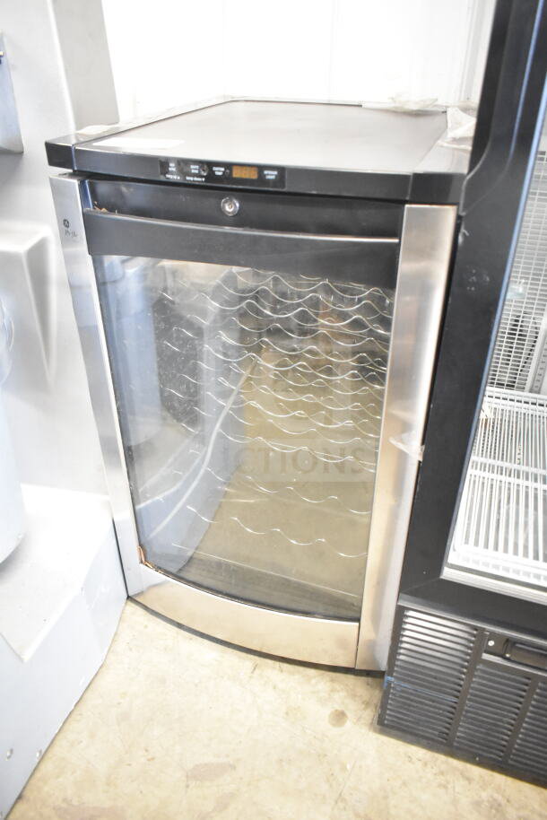 General Electric GE PWR04FANBBS mini beverage cooler, single door, clear front, 115V, commercial use, good condition.