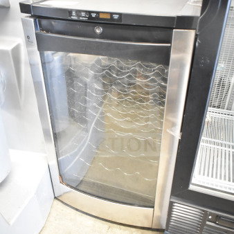 General Electric GE PWR04FANBBS mini beverage cooler, single door, clear front, 115V, commercial use, good condition.