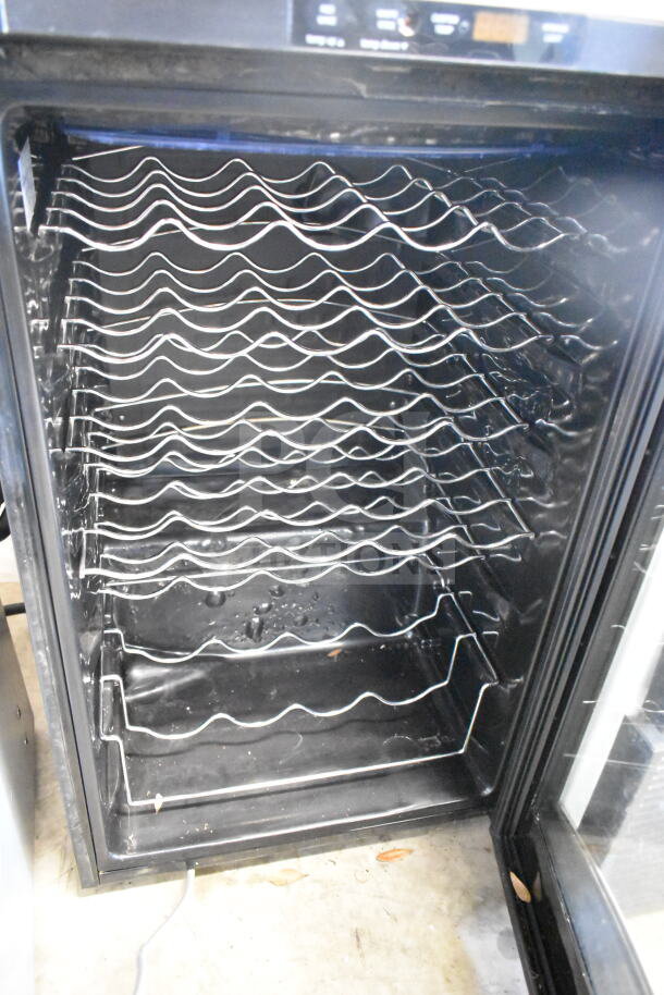 General Electric GE PWR04FANBBS commercial mini beverage cooler, single door, empty interior, stainless racks.