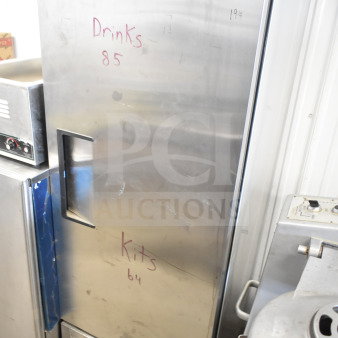 2020 True T-12-HC commercial cooler, single door, stainless steel, 115V, visible wear, markings on door, ideal for beverages.