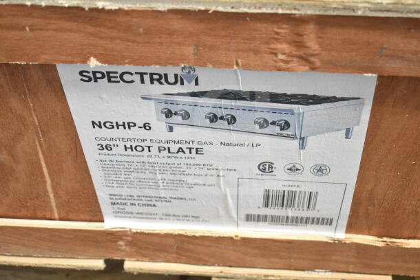 Brand new Spectrum NGHP-6 36" gas hotplate with 6 burners, manual controls, in original packaging.