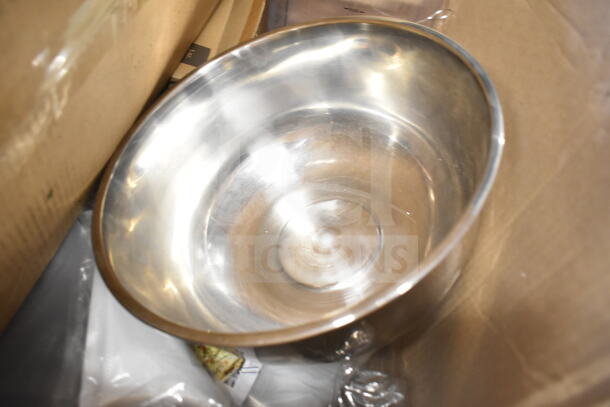 Lot of kitchen items including a large stainless steel bowl, various pans, and utensils. Items appear in good condition.