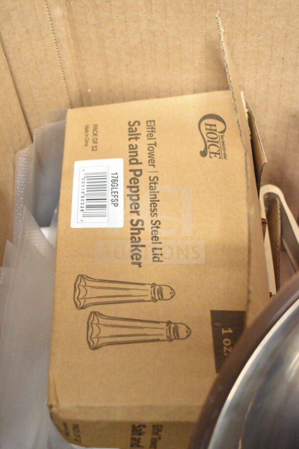 Cardboard box labeled "Eiffel Tower Stainless Steel Lid Salt and Pepper Shaker" with bar code 176GLEFSP inside a lot.