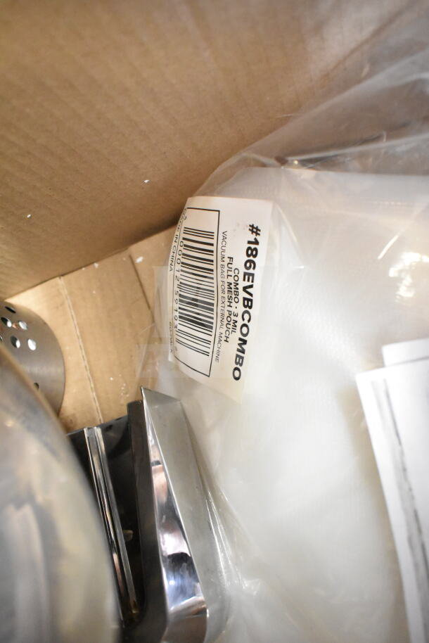 Box with assorted frying pans and utensils, includes #186EVBCOMBO label, new condition, packed with care.
