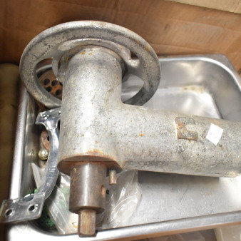 Meat grinder attachment with tray, metal body, shows signs of rust and wear. Suitable for kitchen equipment collectors.