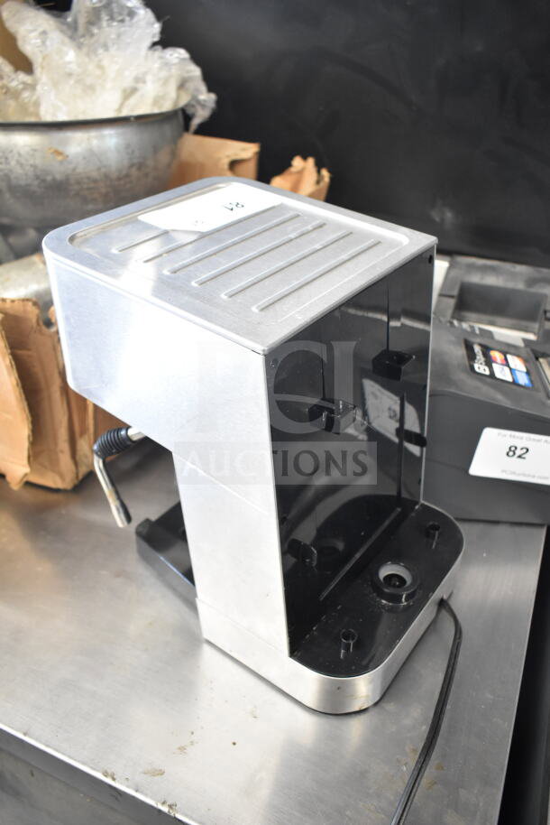 Jura 118 espresso machine, stainless steel, with steam wand. 120V, 1 phase. Slight wear. Labeled "R-1."