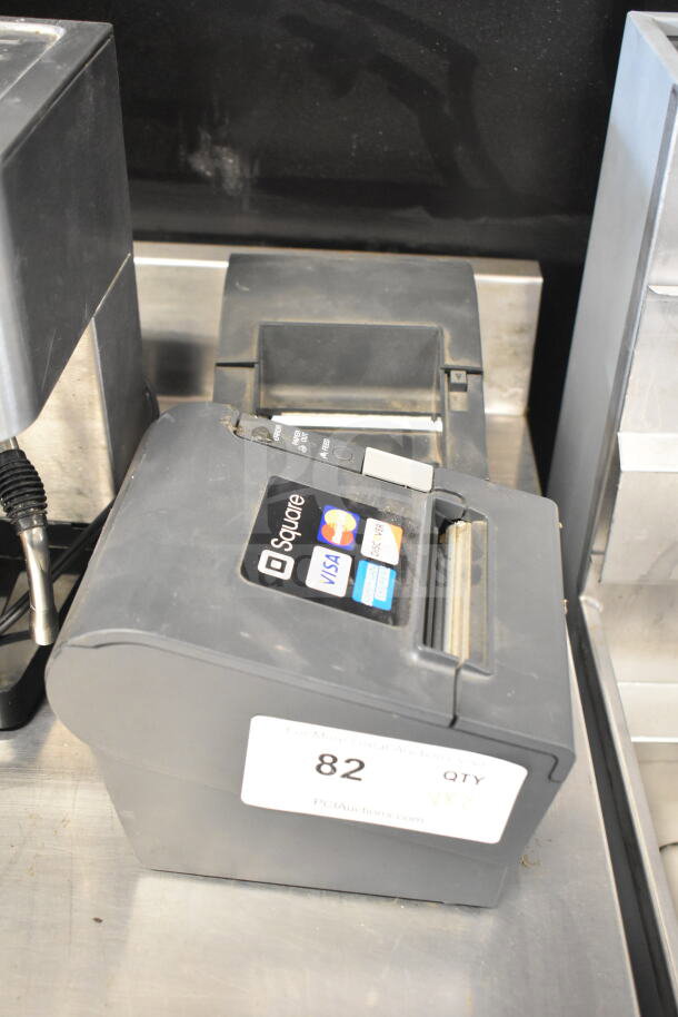 Epson M129H receipt printer, gray, used condition, display labels for Square, Visa, Mastercard. Auction tag "QTY 2x".