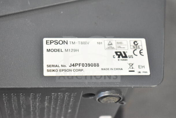 Epson receipt printer, model M129H, with serial number J4PF039088. Label shows certifications and "Made in China."