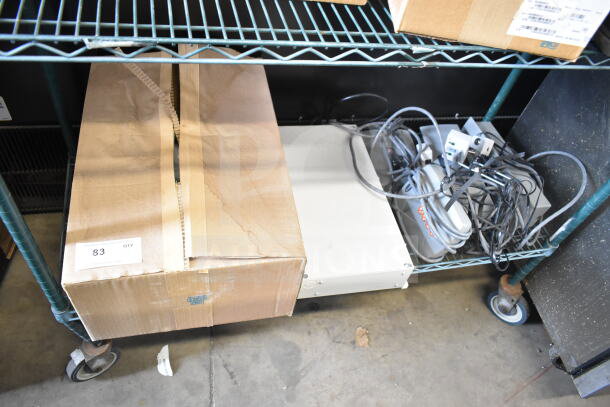 6 Sensormatic items including ZE9060 controller, ZBSMPSPE antenna deactivators, ZBSMPCPE Pad Pro; boxed and cabled.