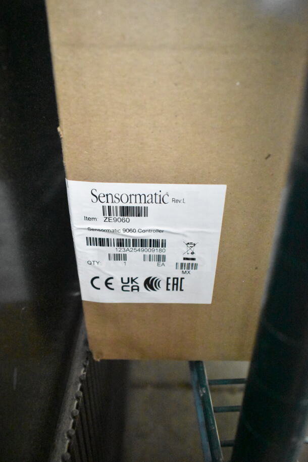 Box with Sensormatic ZE9060 Controller label, includes barcode and certification marks, quantity noted as 1 unit.