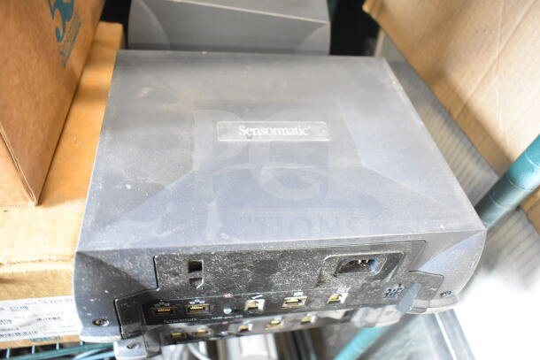 Sensormatic AMB-9010-IPS label deactivator, slightly dusty, shows ports and power inlet, logo on top, auction lot of five.