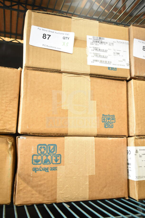 Cardboard boxes containing 3 Sensormatic ZBAMB9012 Deactivators. Labels show item info and quantity. New condition.